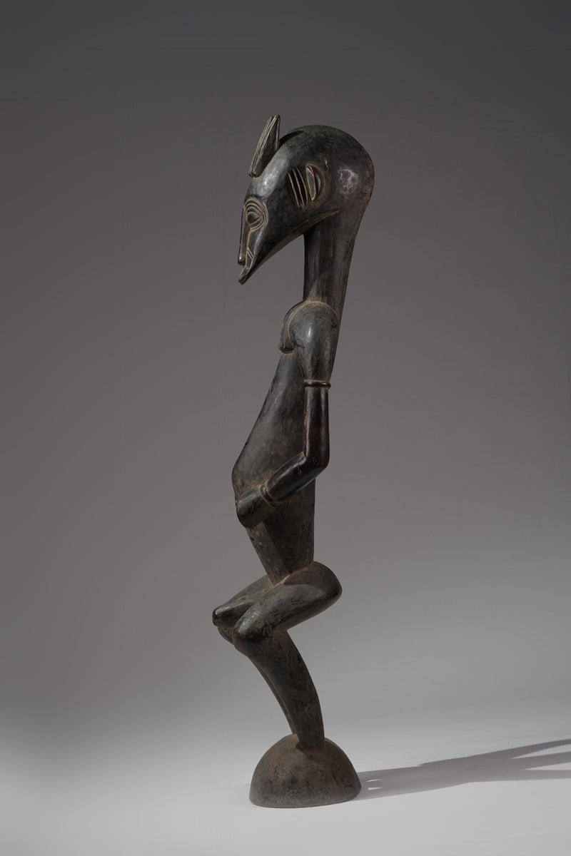 A male guardian figure of the Senufo