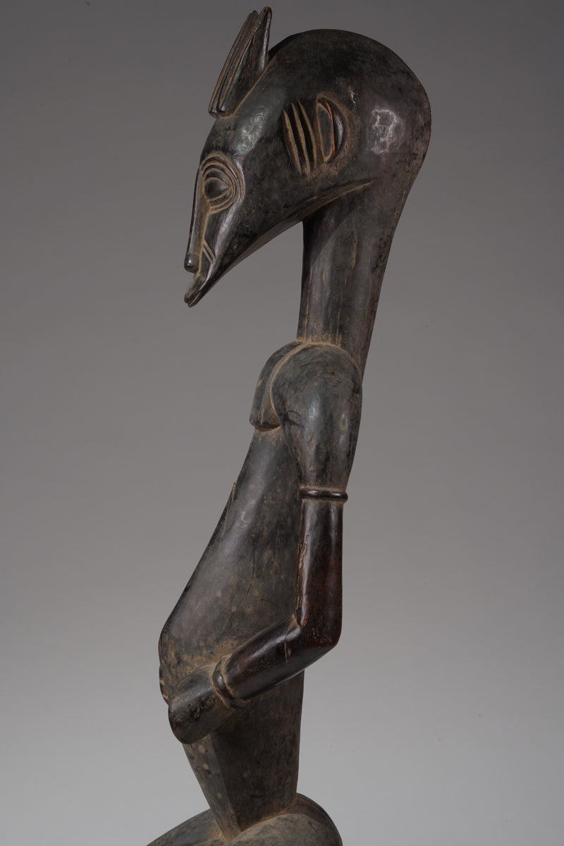 A male guardian figure of the Senufo