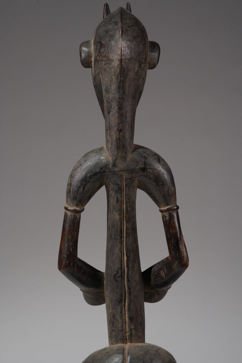 A male guardian figure of the Senufo