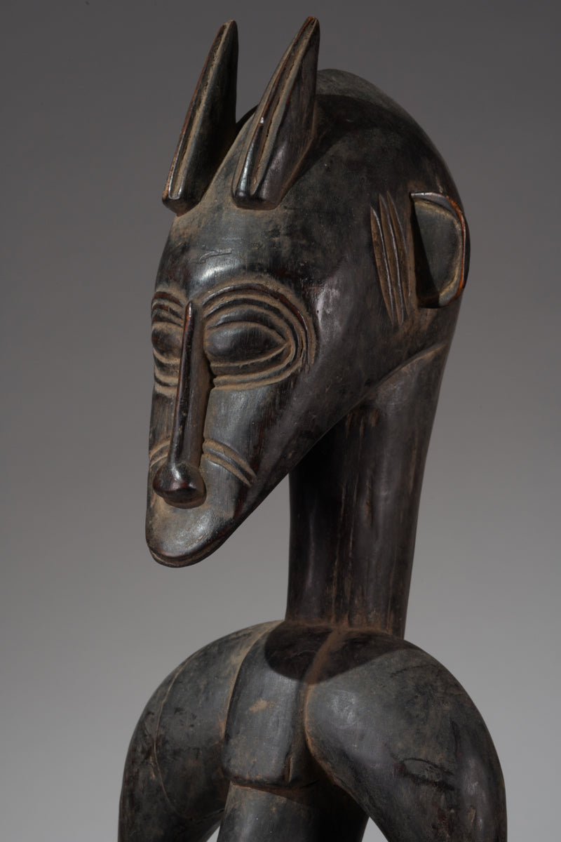 A male guardian figure of the Senufo