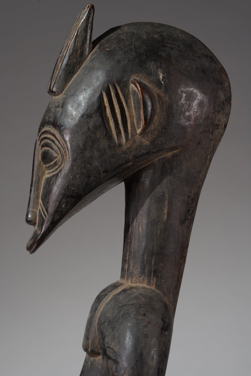 A male guardian figure of the Senufo