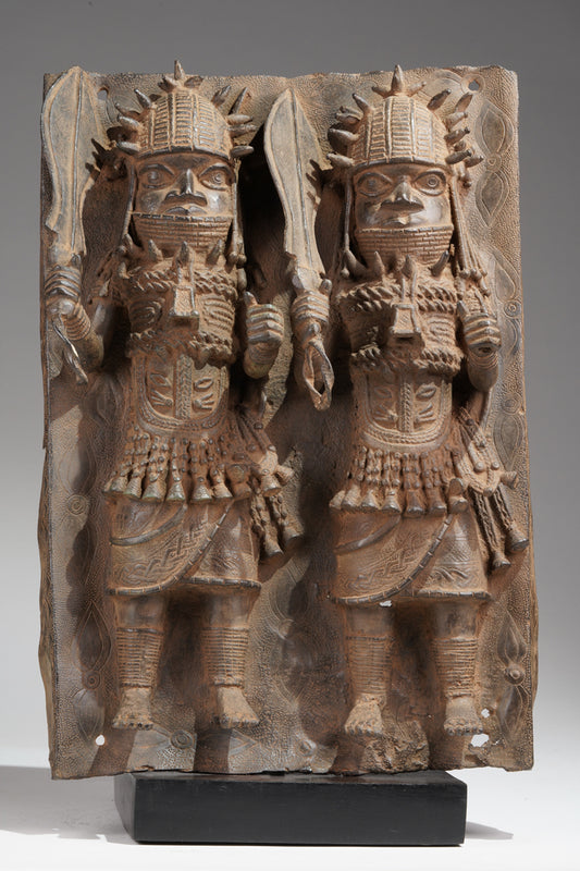 An Ama of two high-ranking persons ceremoniously holding swords