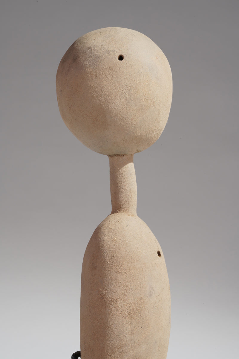 A Prampram sculptural couple