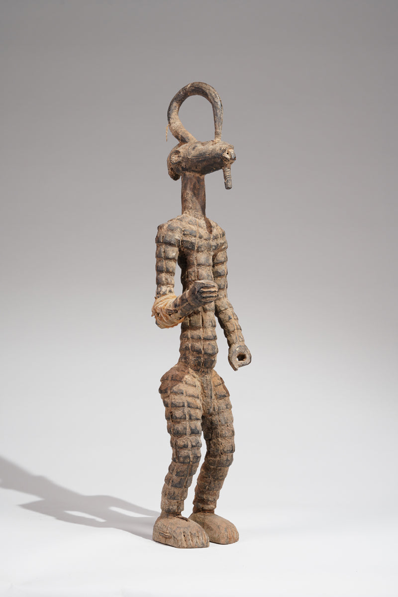 A sculpture of a Bobo dancer