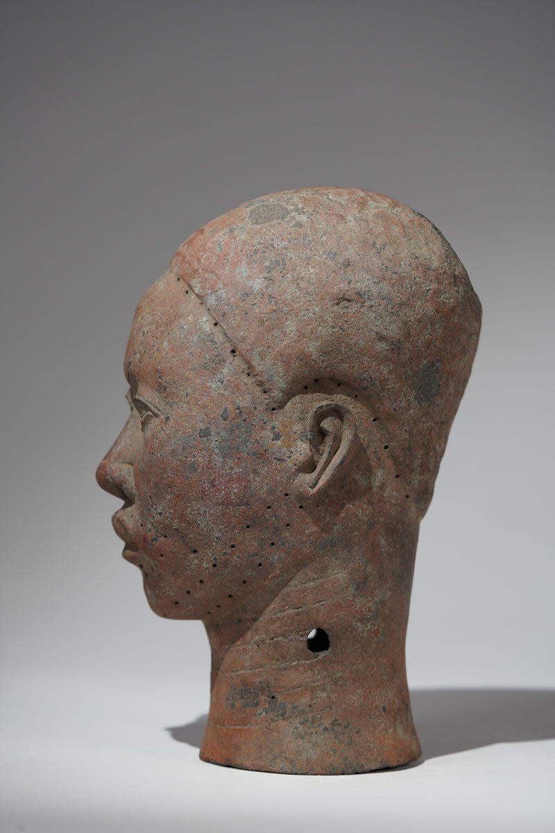A naturalistic, thinwalled bronze head