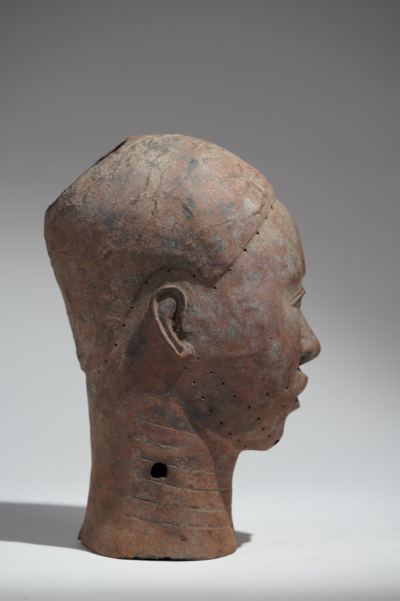 A naturalistic, thinwalled bronze head