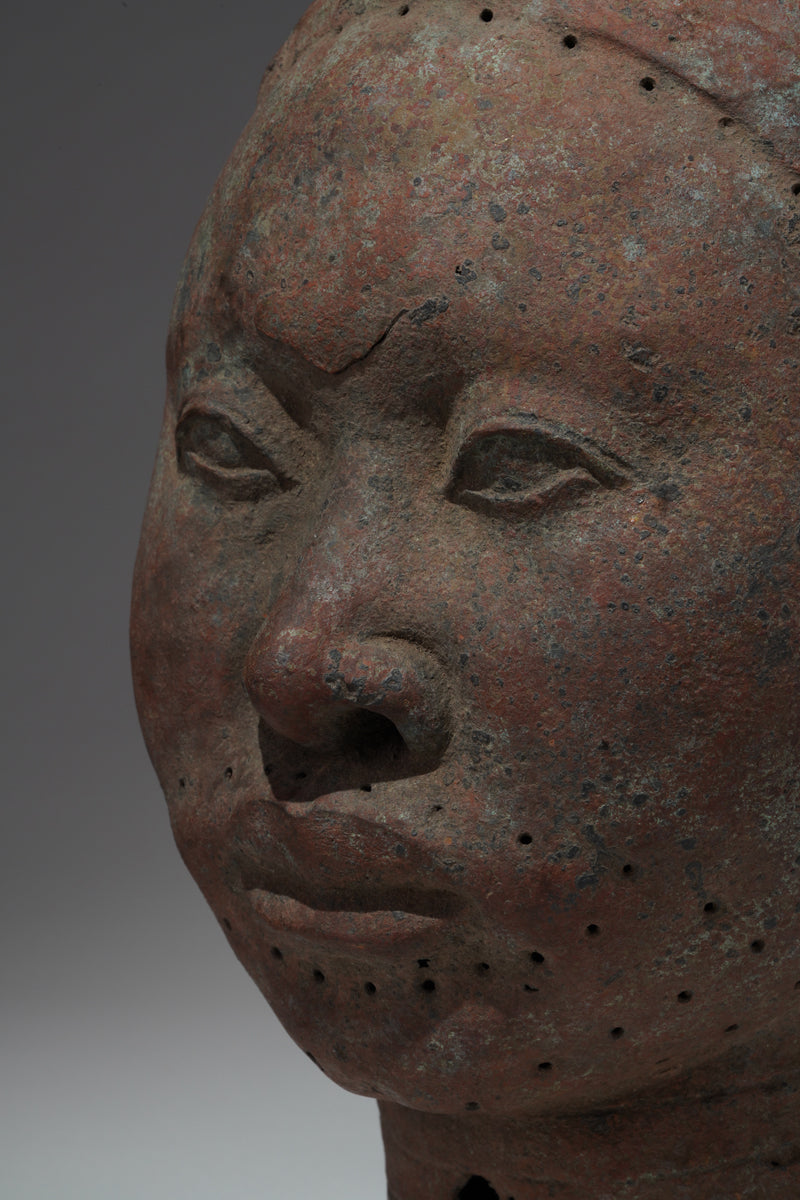 A naturalistic, thinwalled bronze head