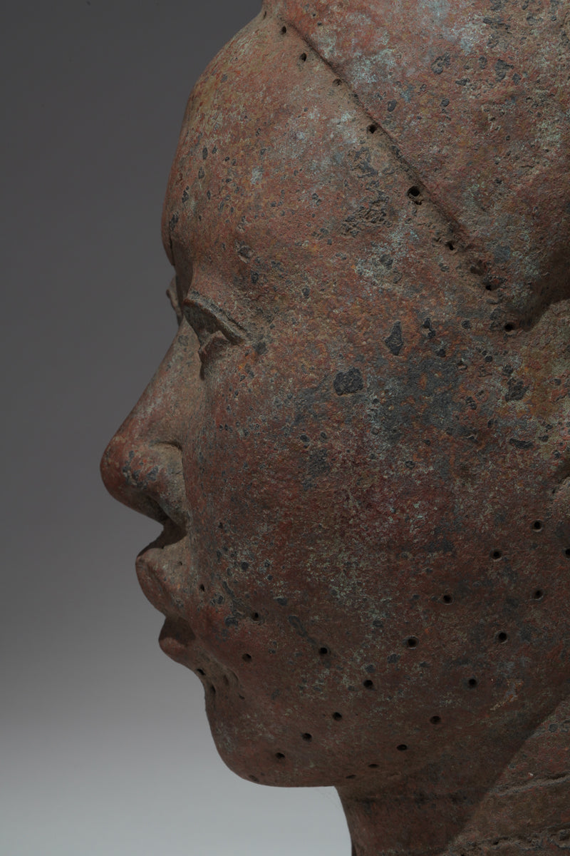 A naturalistic, thinwalled bronze head
