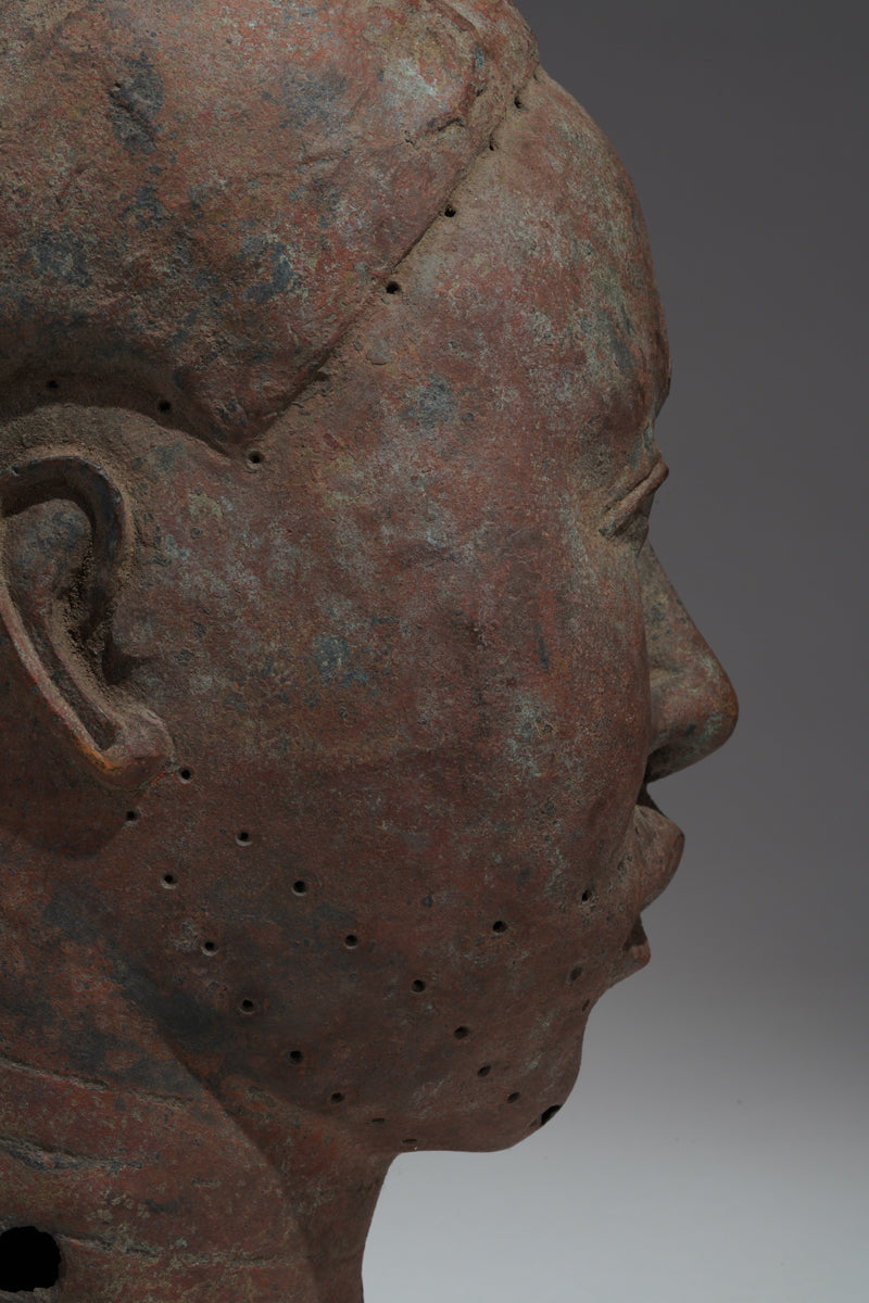 A naturalistic, thinwalled bronze head