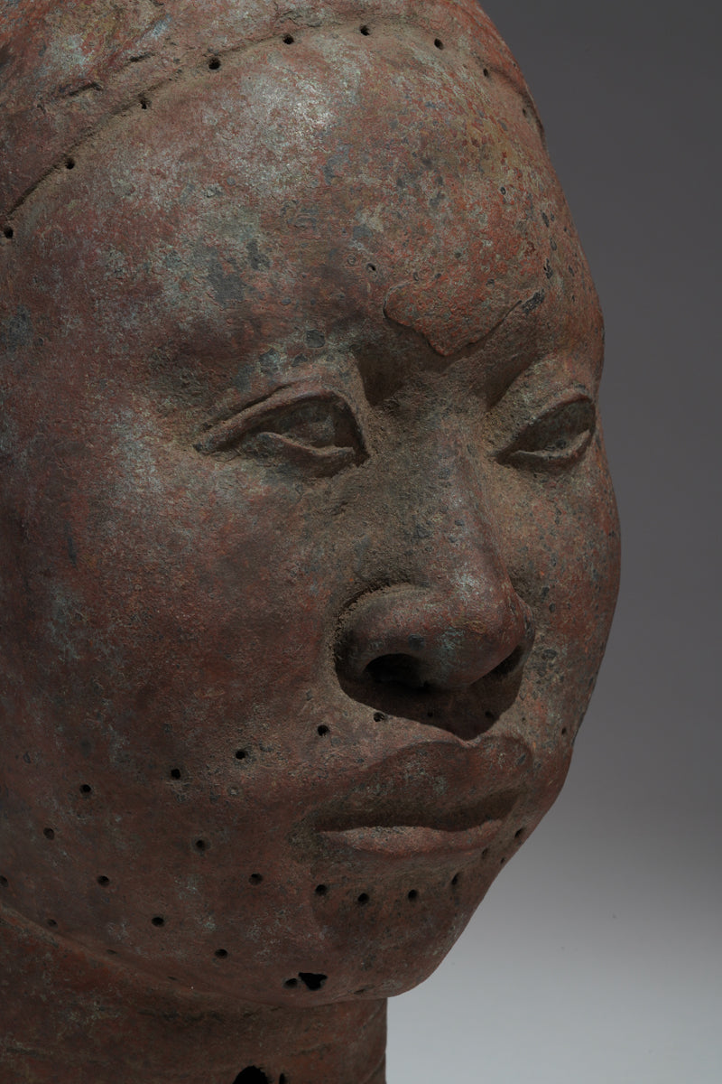A naturalistic, thinwalled bronze head