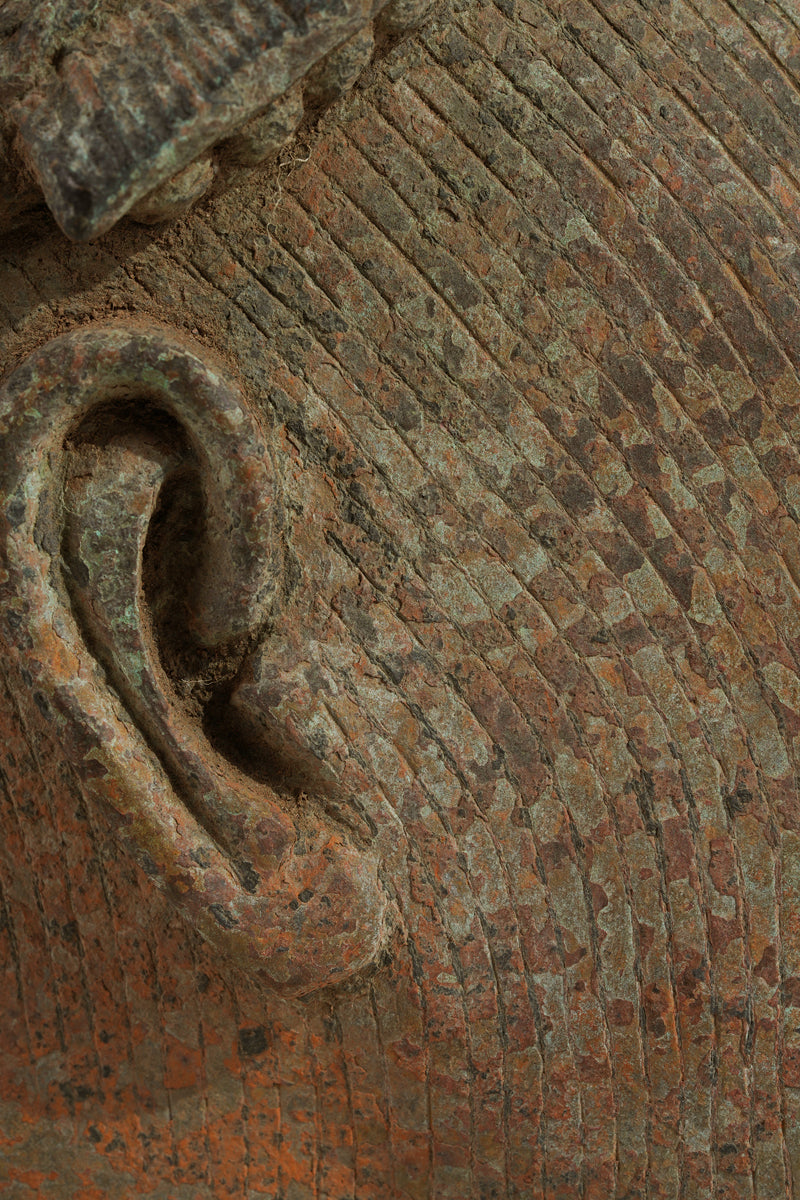 A crowned bronze head of Olokun
