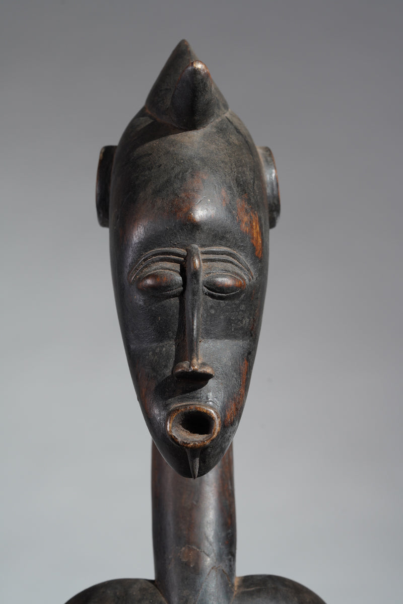 A female Senufo Rhythm pounder - called Débéle