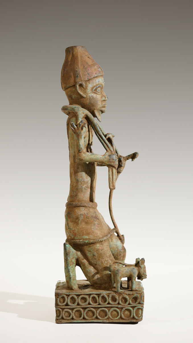 A Benin Bronze of a hunter in Tada style