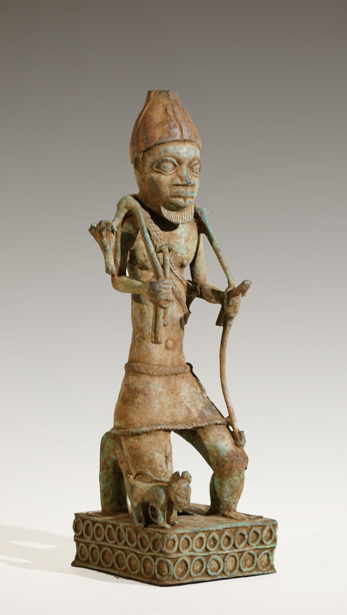 A Benin Bronze of a hunter in Tada style