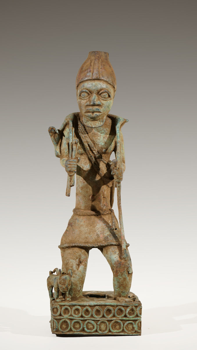 A Benin Bronze of a hunter in Tada style