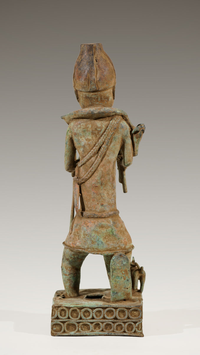 A Benin Bronze of a hunter in Tada style