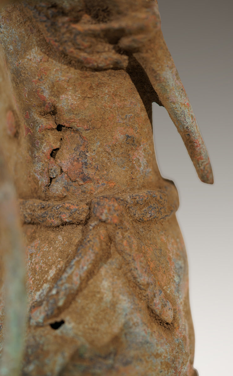 A Benin Bronze of a hunter in Tada style