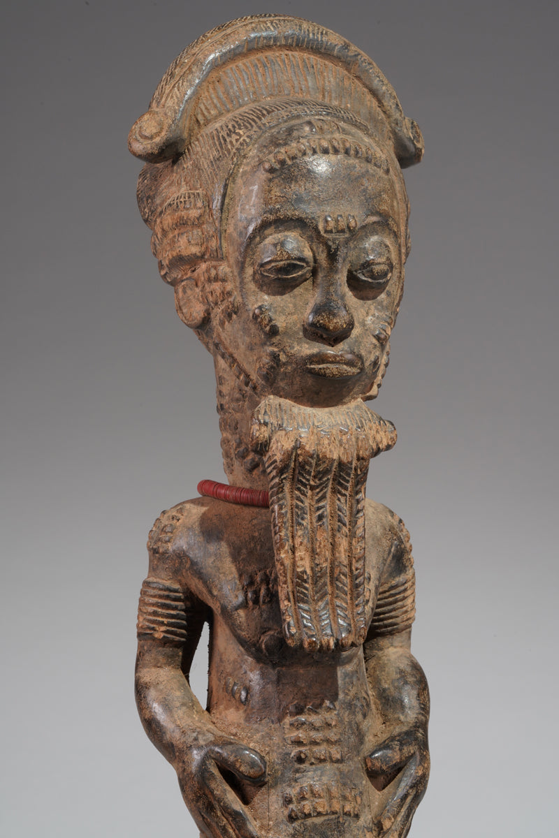 A male Baule sculpture