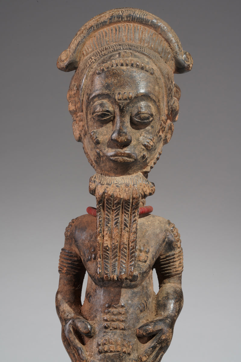 A male Baule sculpture
