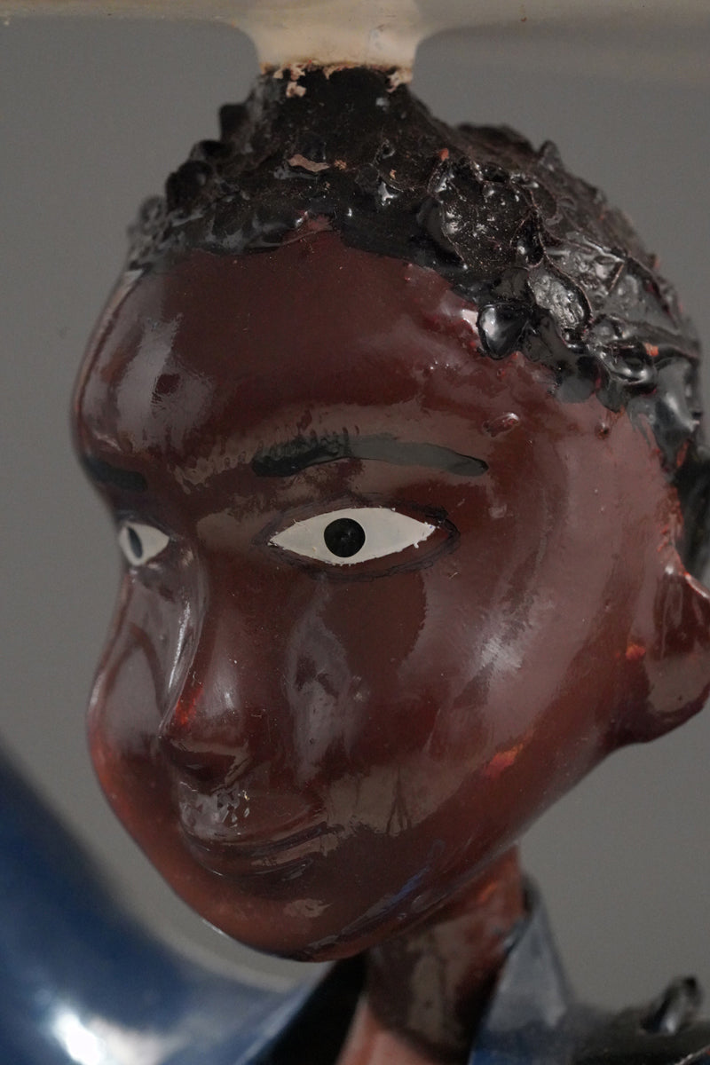 A Mechanic with a Fridge, Tools, and Gas Bottle