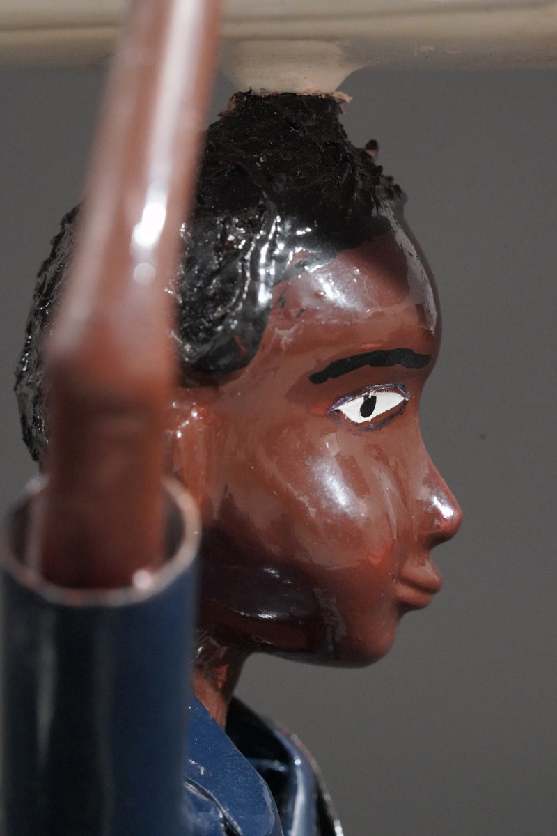 A Mechanic with a Fridge, Tools, and Gas Bottle