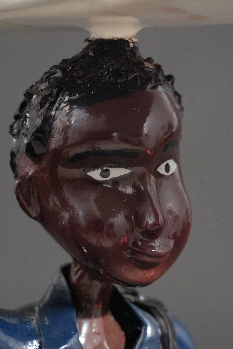 A Mechanic with a Fridge, Tools, and Gas Bottle