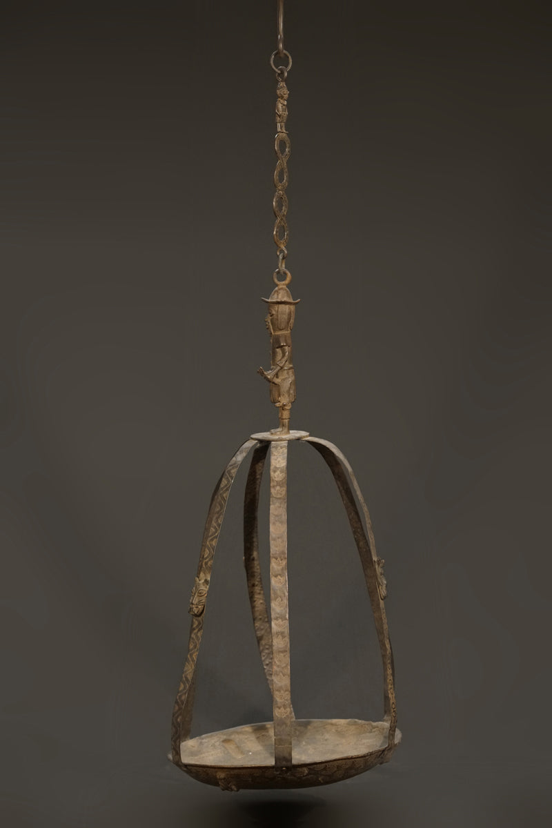 A Benin bronze oil lamp