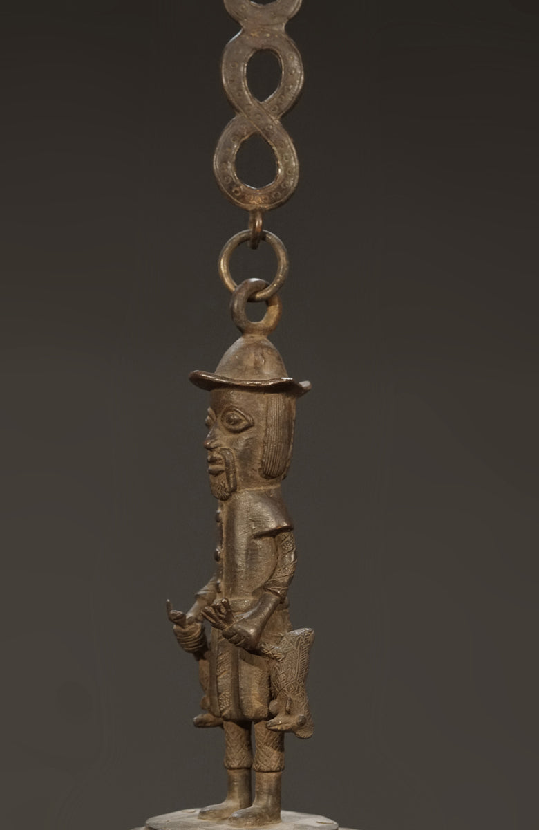 A Benin bronze oil lamp