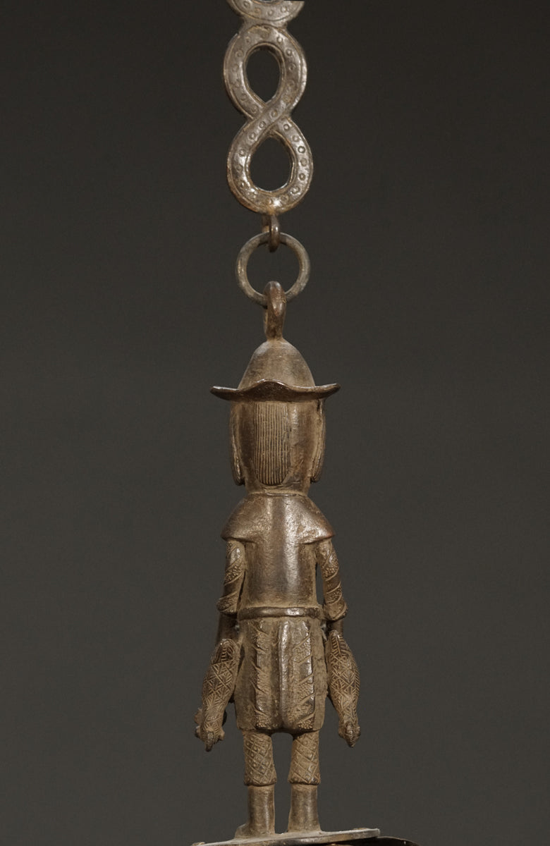 A Benin bronze oil lamp