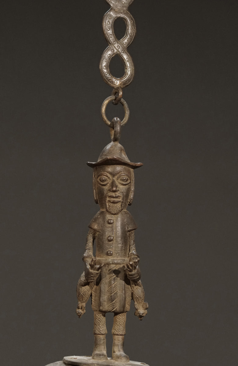 A Benin bronze oil lamp