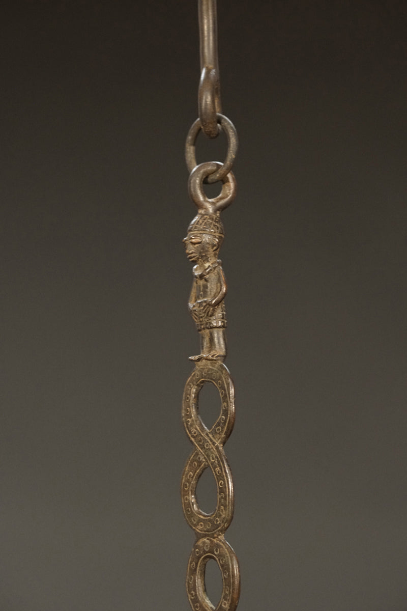 A Benin bronze oil lamp
