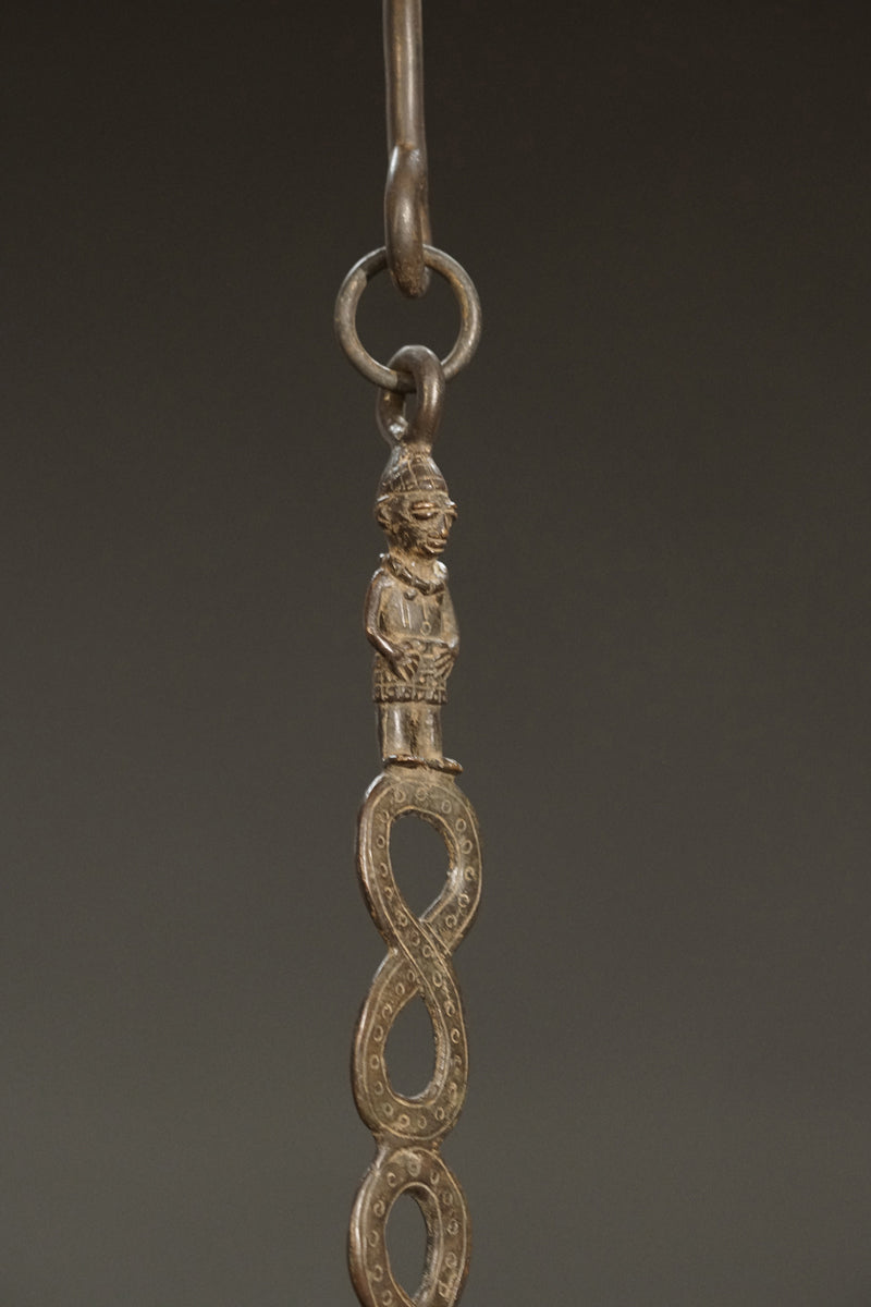 A Benin bronze oil lamp