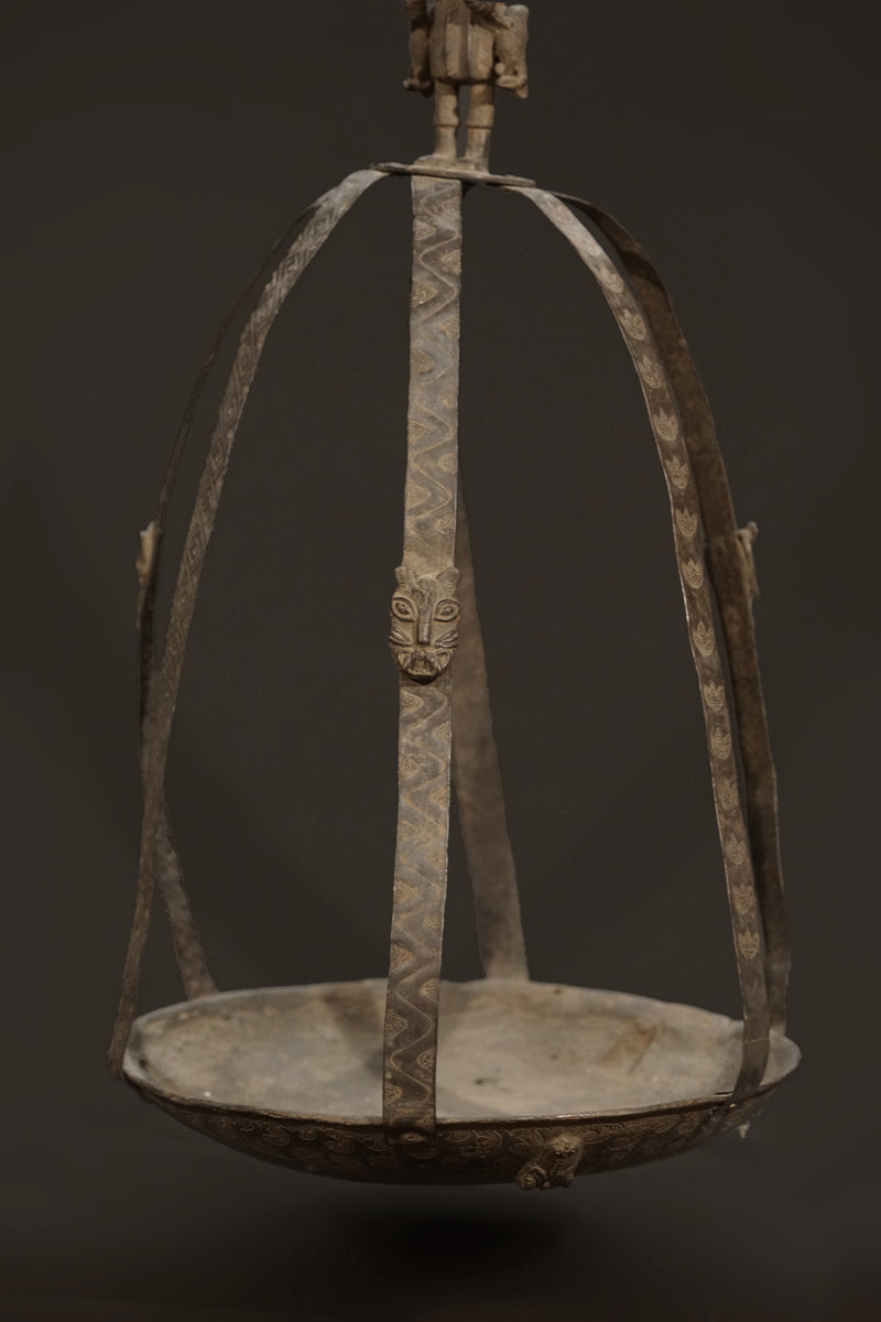 A Benin bronze oil lamp