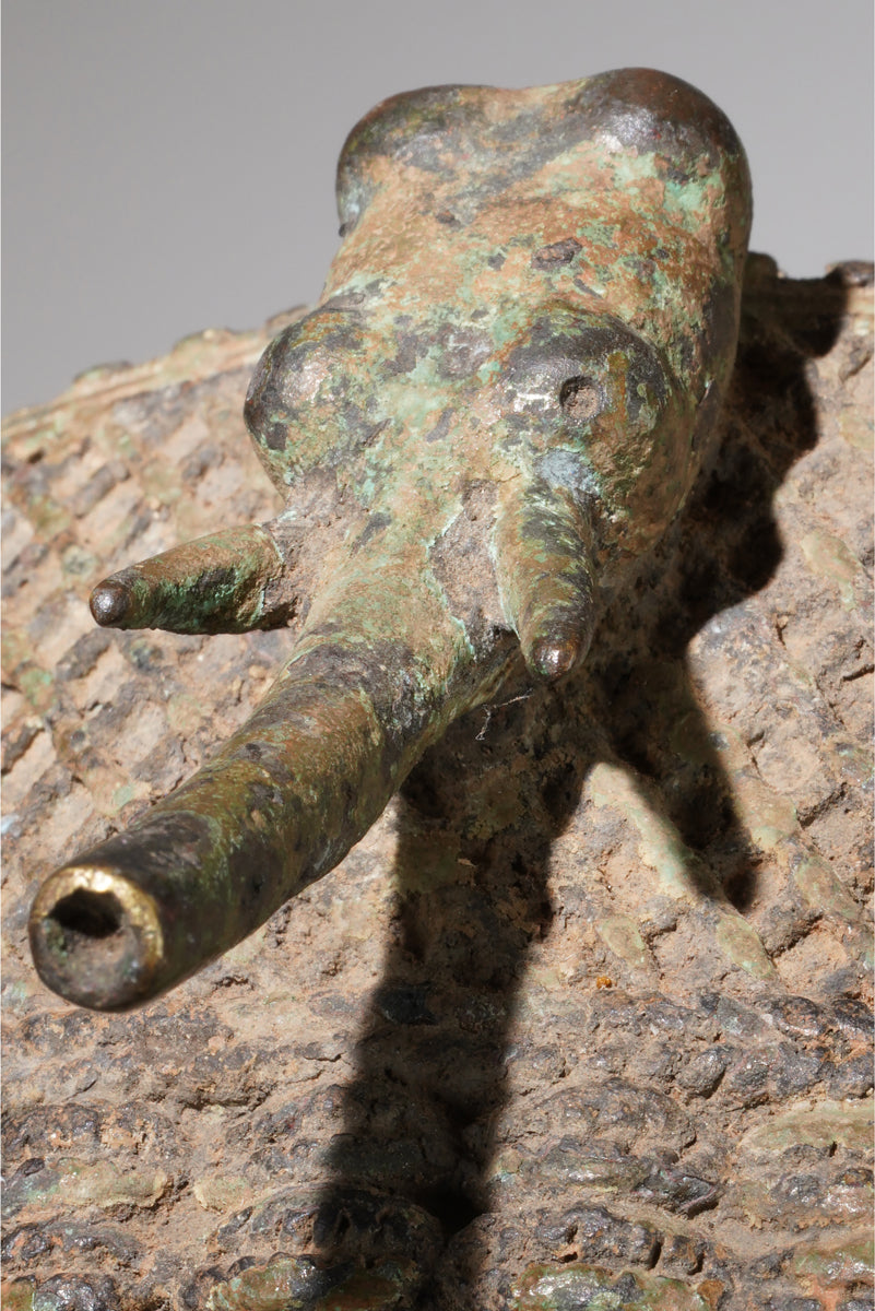 A Yoruba bronze mask