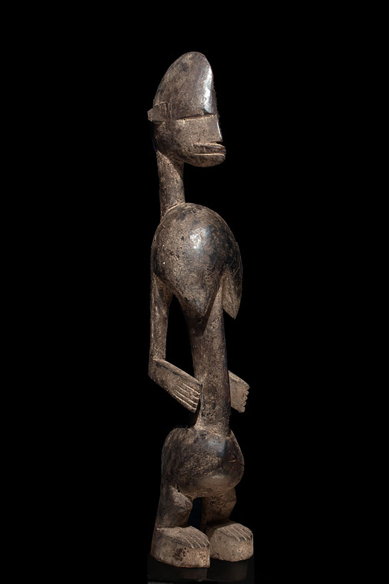 A female d'Jonka ancestor figure