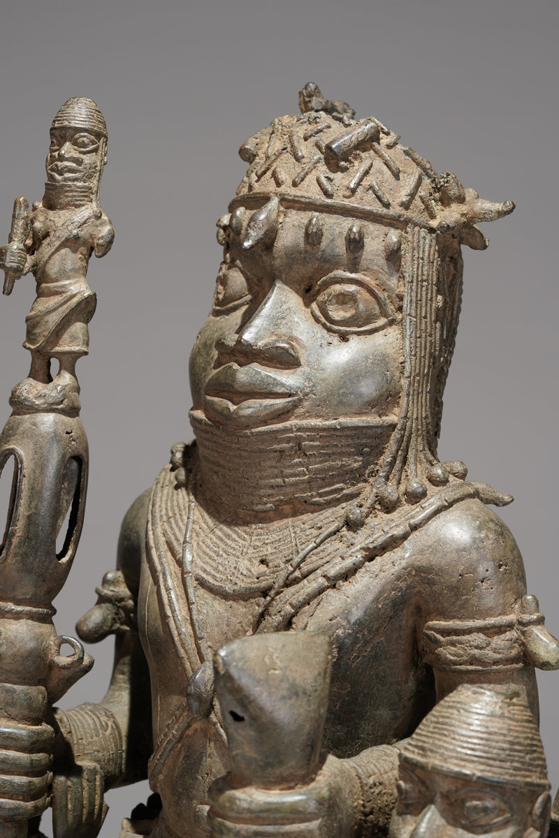 A bronze statue of an Oba in the Benin style