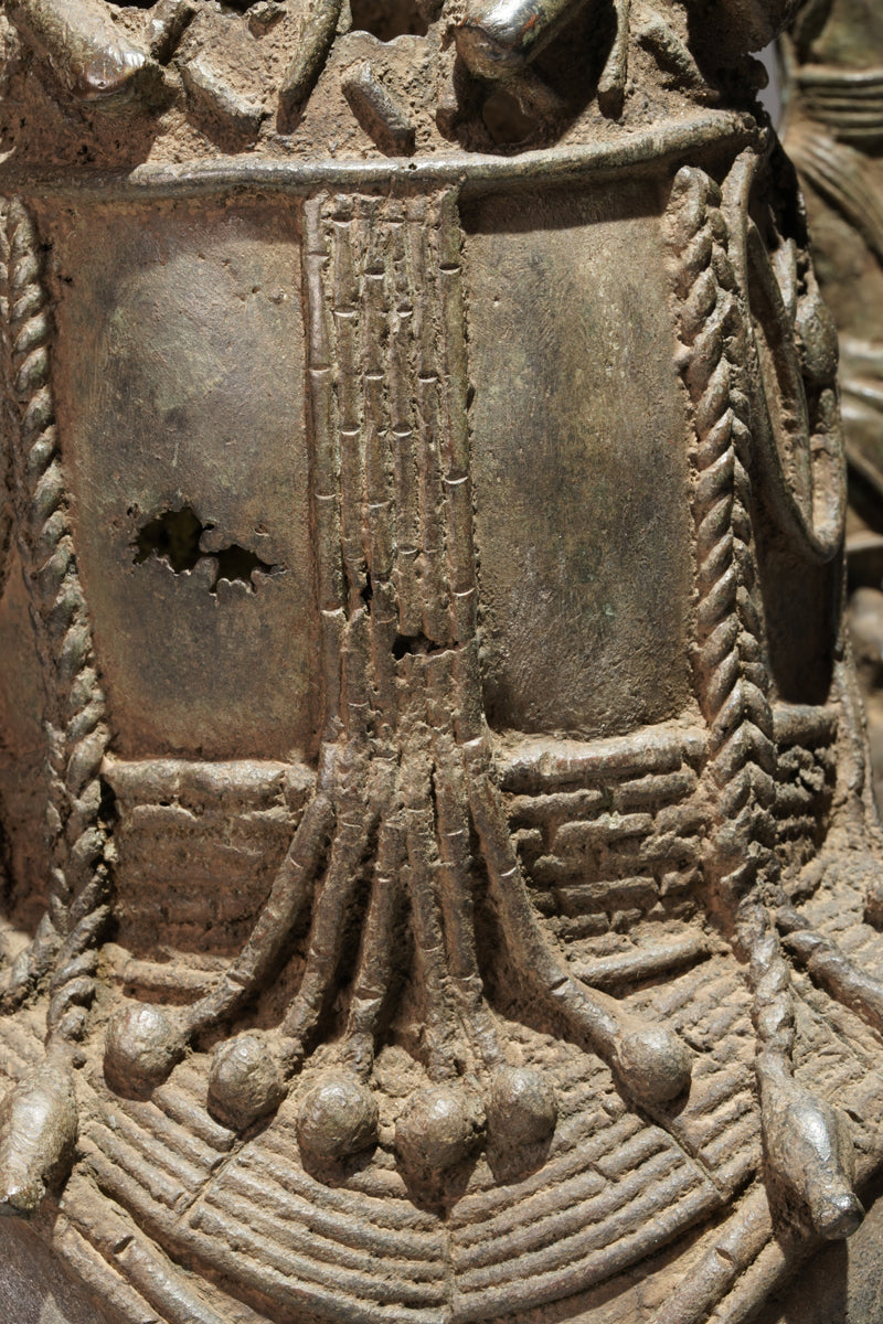 A bronze statue of an Oba in the Benin style