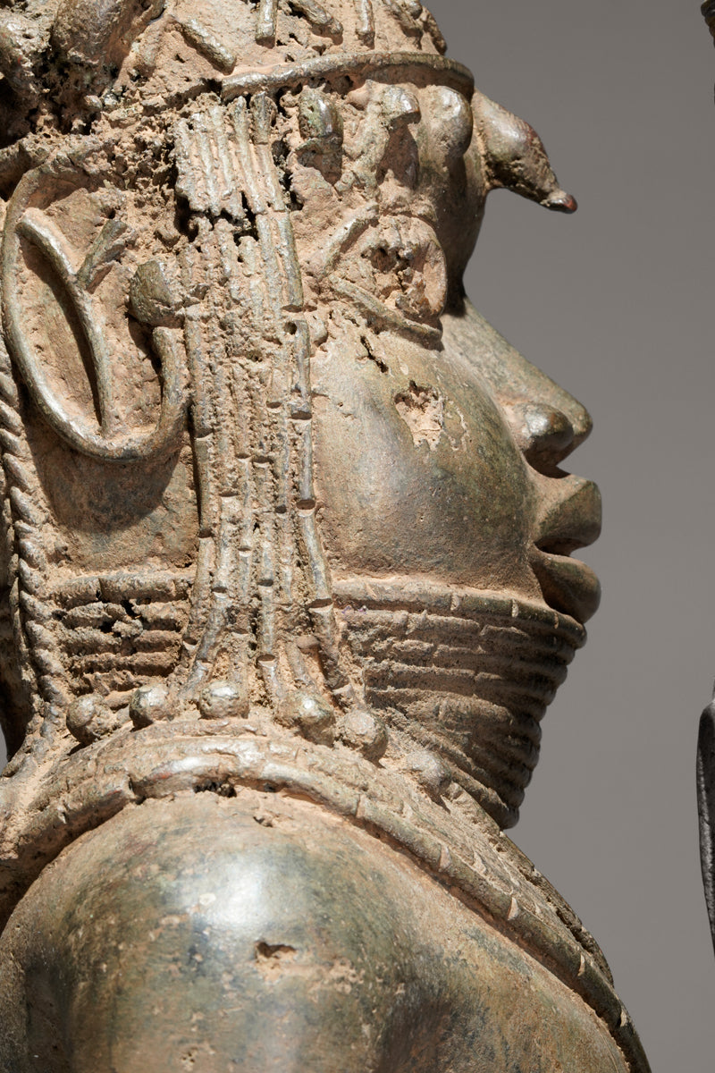 A bronze statue of an Oba in the Benin style
