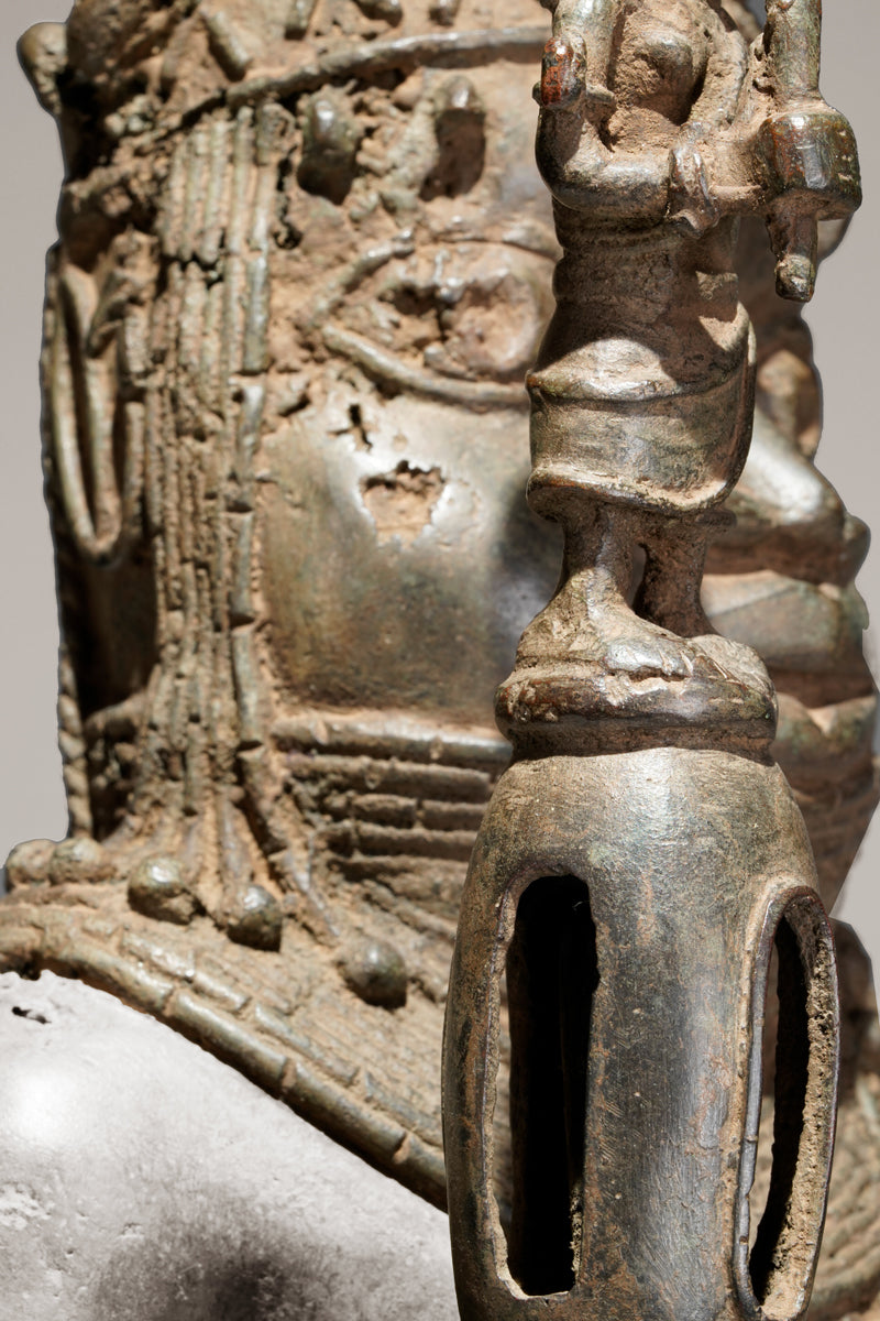 A bronze statue of an Oba in the Benin style