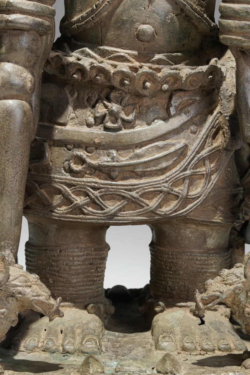 A bronze statue of an Oba in the Benin style