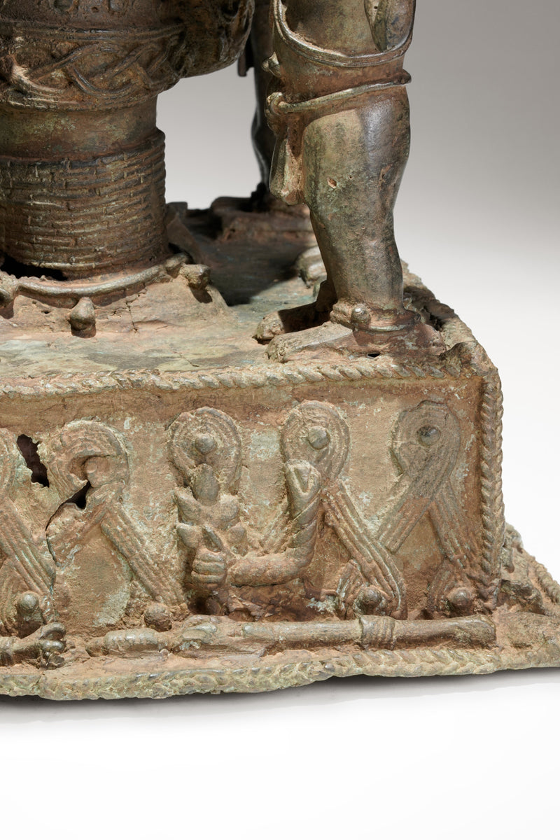 A bronze statue of an Oba in the Benin style