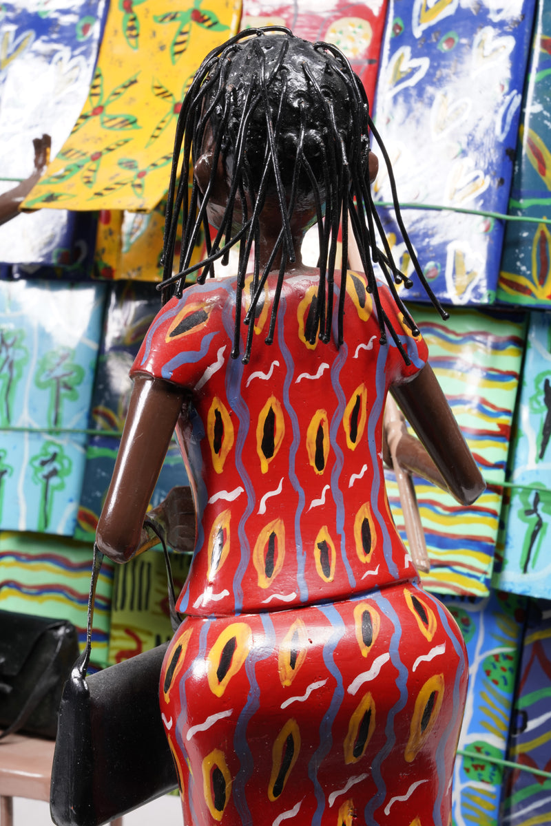 Two women dressed in typical African textiles