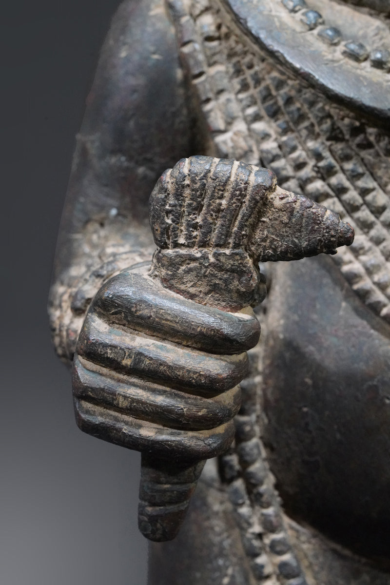 A bronze sculpture of an Ooni (Oba)