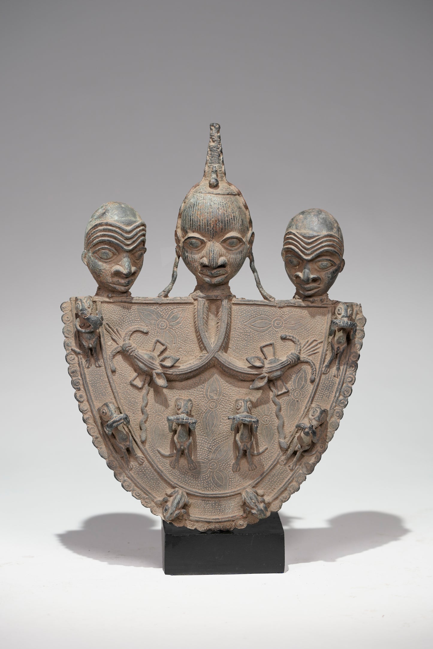 A Bronze Plaque in the style of Benin/ Ife