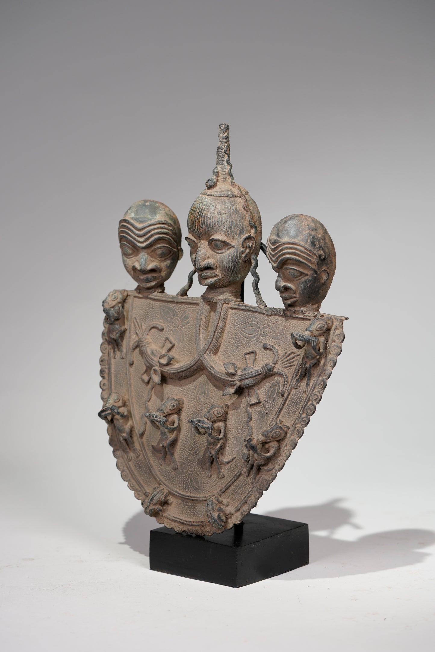 A Bronze Plaque in the style of Benin/ Ife
