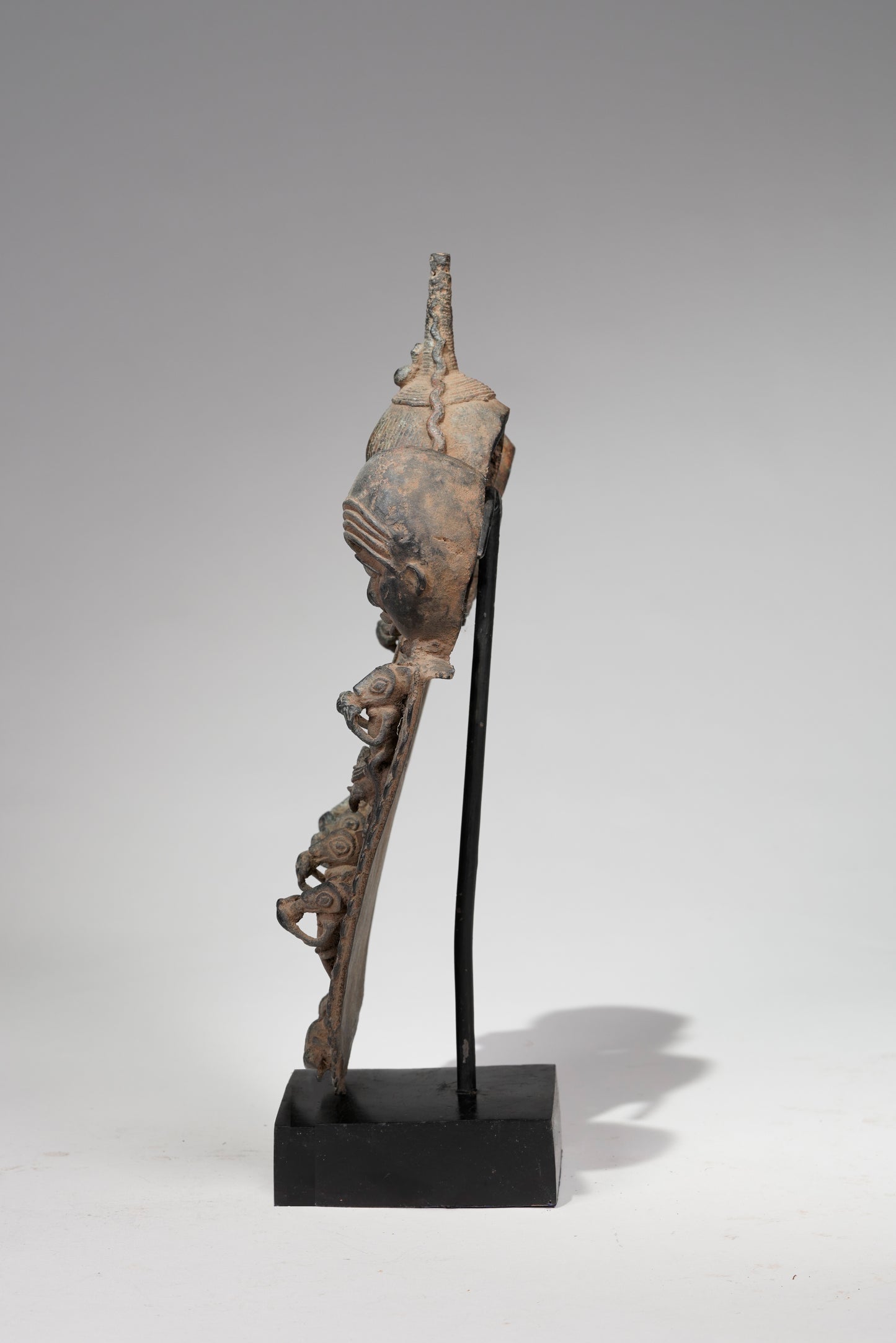A Bronze Plaque in the style of Benin/ Ife