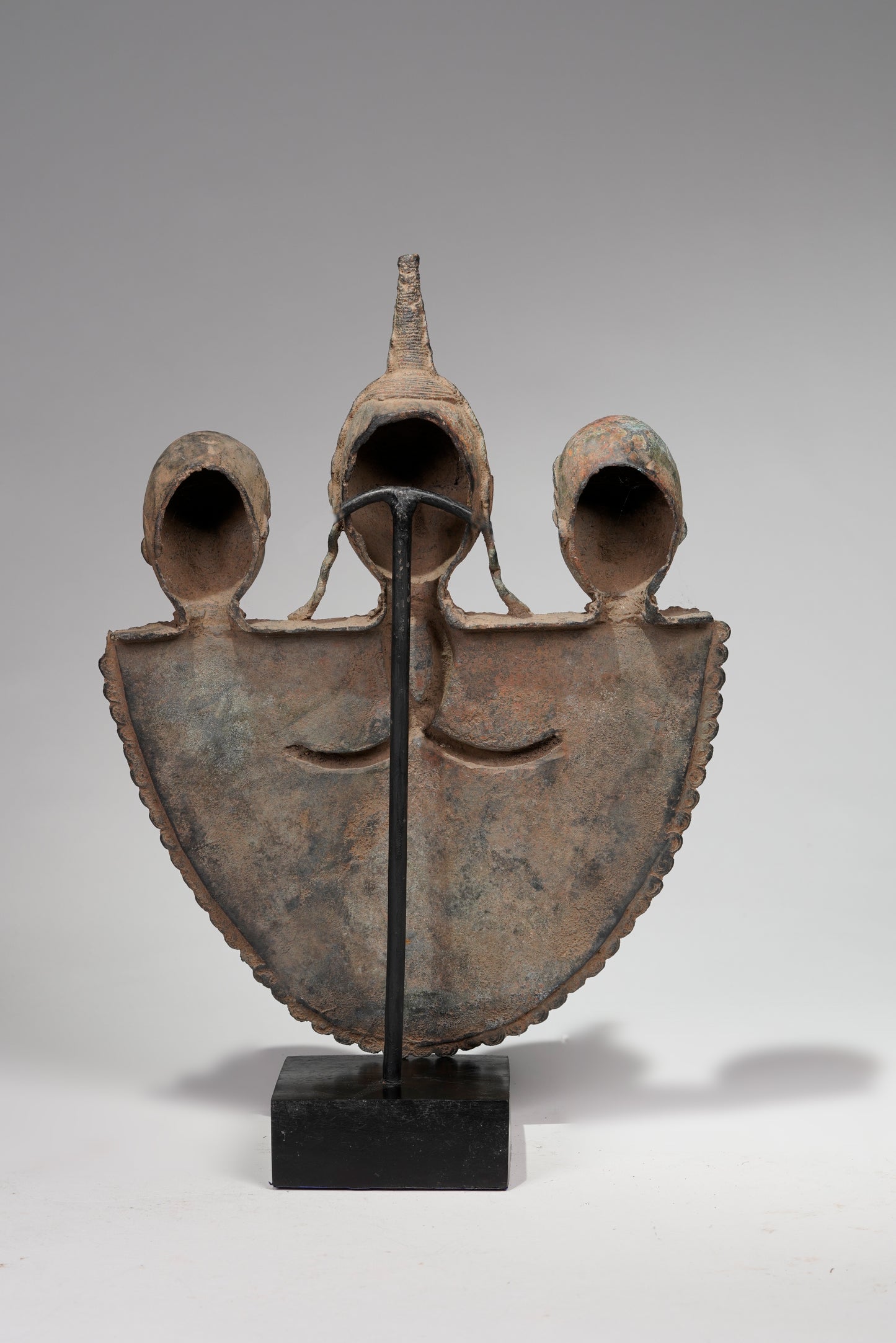 A Bronze Plaque in the style of Benin/ Ife