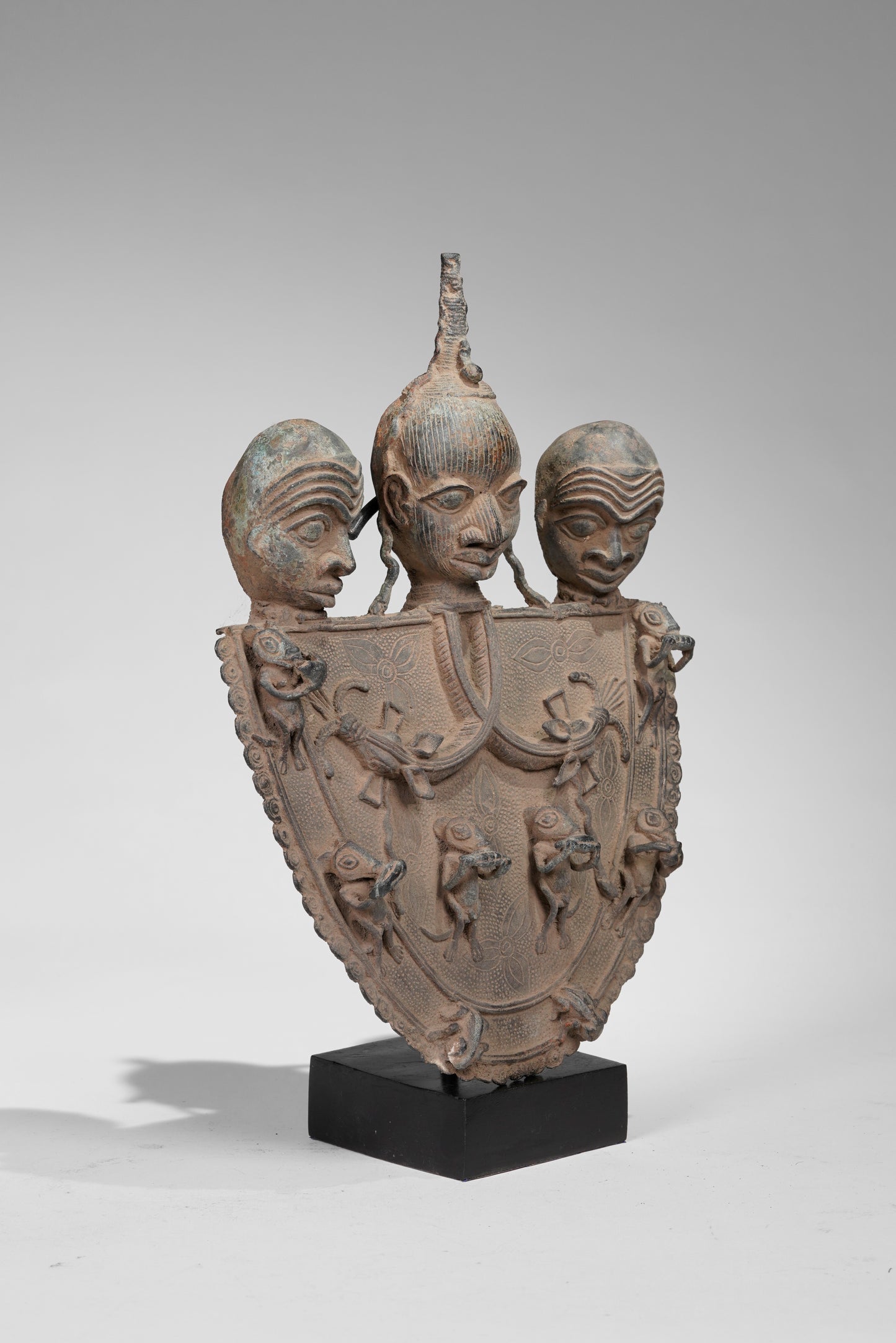 A Bronze Plaque in the style of Benin/ Ife