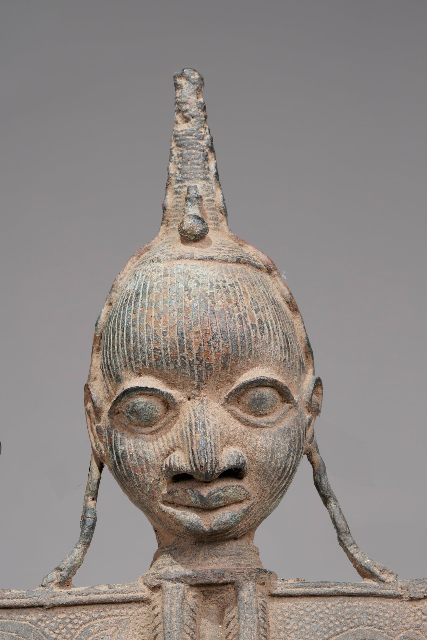 A Bronze Plaque in the style of Benin/ Ife
