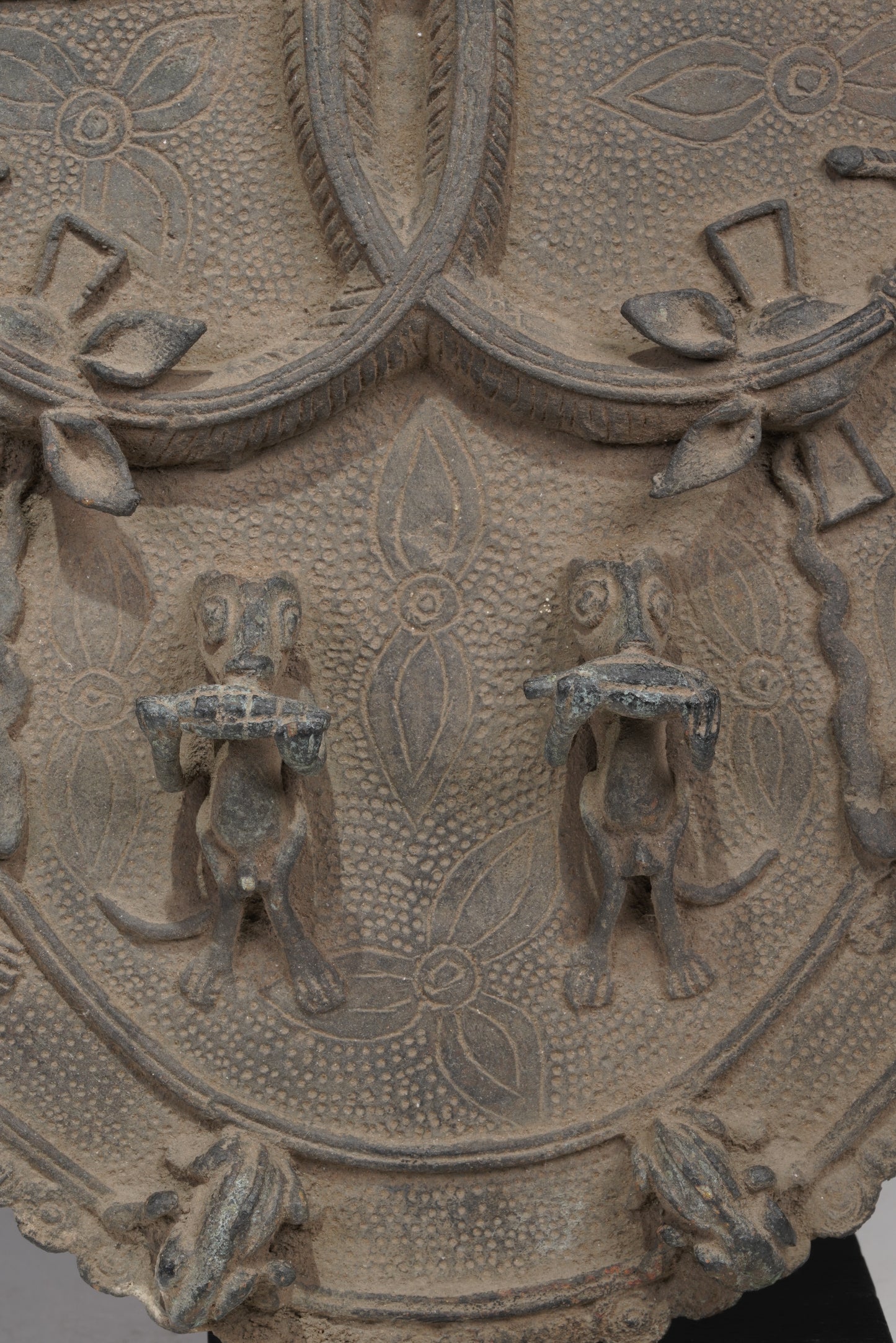 A Bronze Plaque in the style of Benin/ Ife